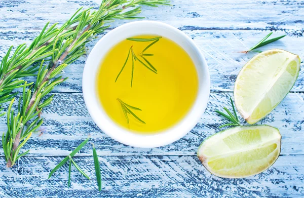 Oil with rosemary — Stock Photo, Image