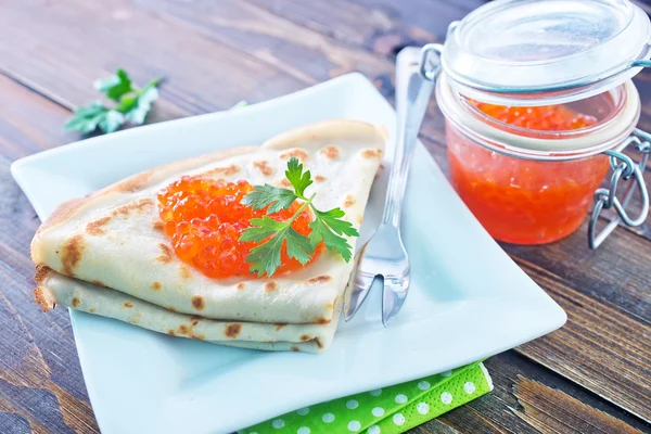 Pancakes with caviar — Stock Photo, Image