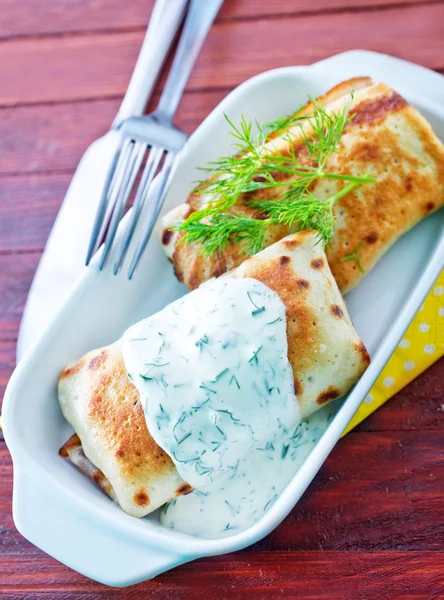 Pancakes with sour cream — Stock Photo, Image