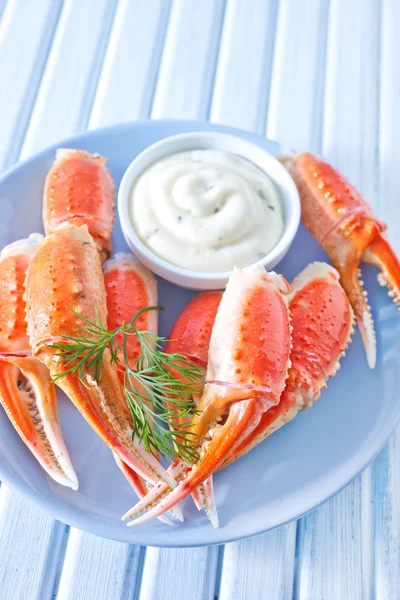 Boiled crab claws with sauce — Stock Photo, Image