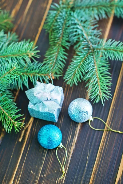 Branch of christmas tree and decorations — Stock Photo, Image