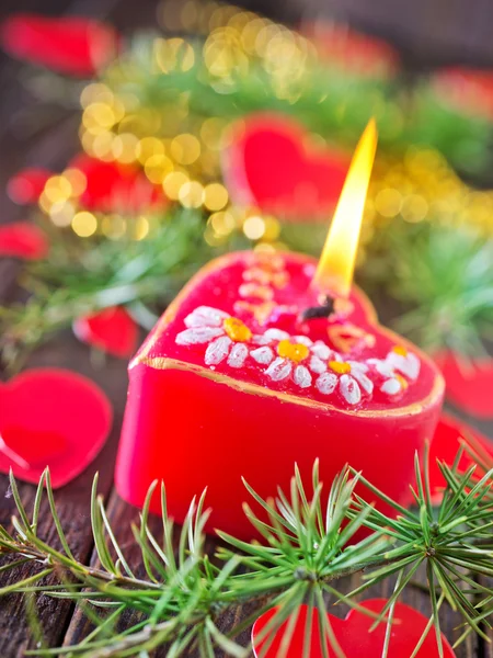 Red candle and christmas decorations — Stockfoto