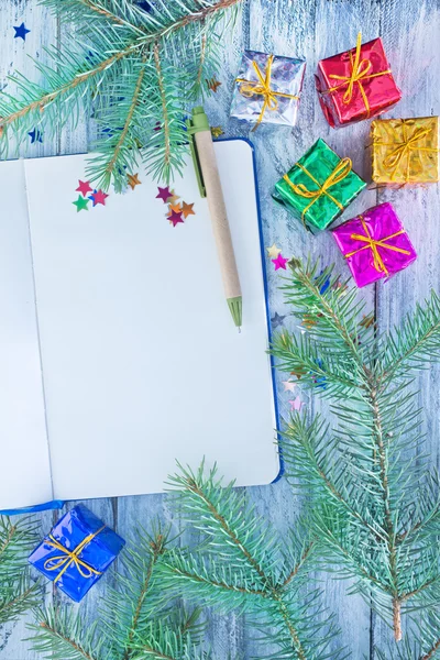 Notepad and christmas decoration — Stock Photo, Image