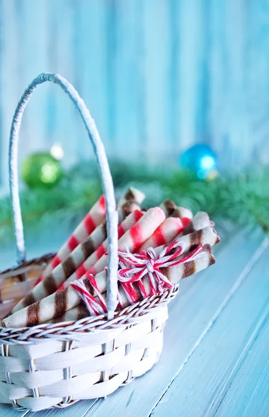 Christmas candies in wooden basket — Stock Photo, Image