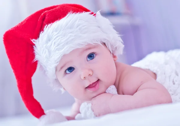 Little baby in santa hat — Stock Photo, Image