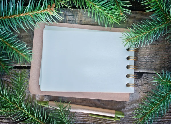 Notebook for note and fir branch — Stock Photo, Image