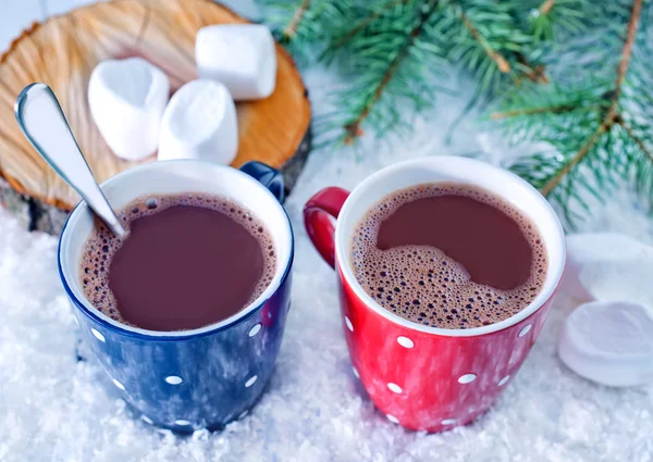 Cocoa drink in red cup — Stock Photo, Image