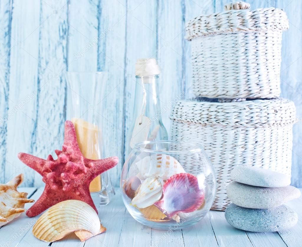 Sea shells in glass bowl