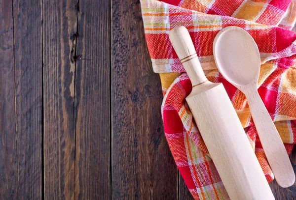 Wooden rolling pin and napkin — Stock Photo, Image