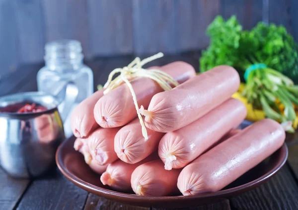 Sausages on plate — Stock Photo, Image