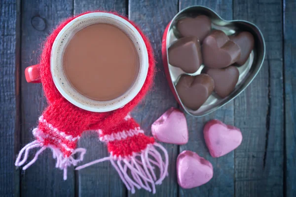 Candy and cocoa in cup — Stock Photo, Image