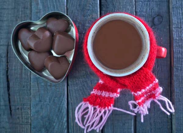 Candy and cocoa in cup — Stock Photo, Image