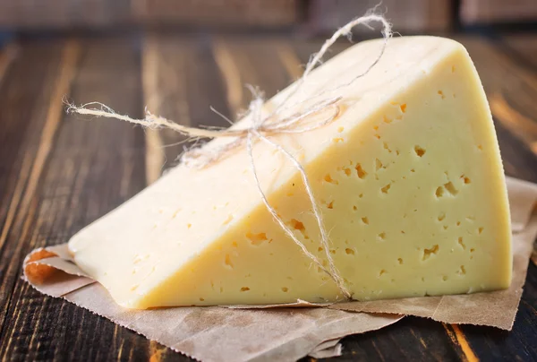 Cheese on the wooden board — Stock Photo, Image