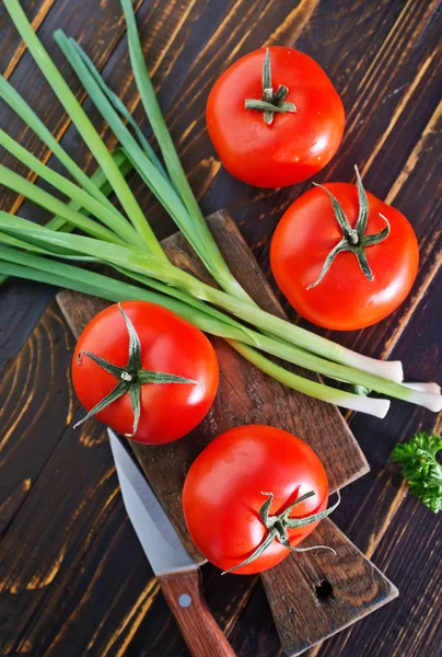 Tomato on board — Stock Photo, Image