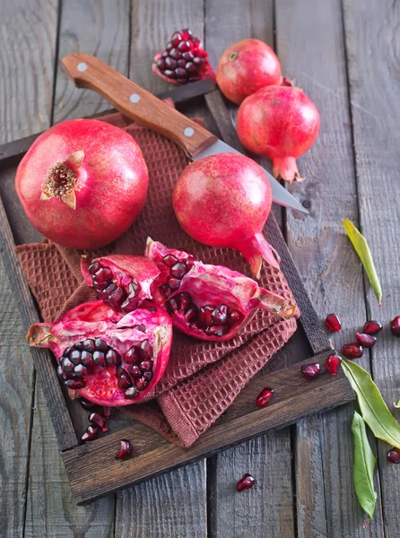 Pomegranate on napkin — Stock Photo, Image