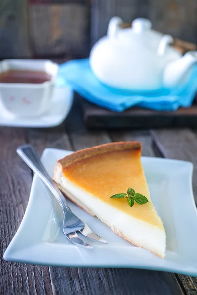 Cheesecake on white plate — Stock Photo, Image