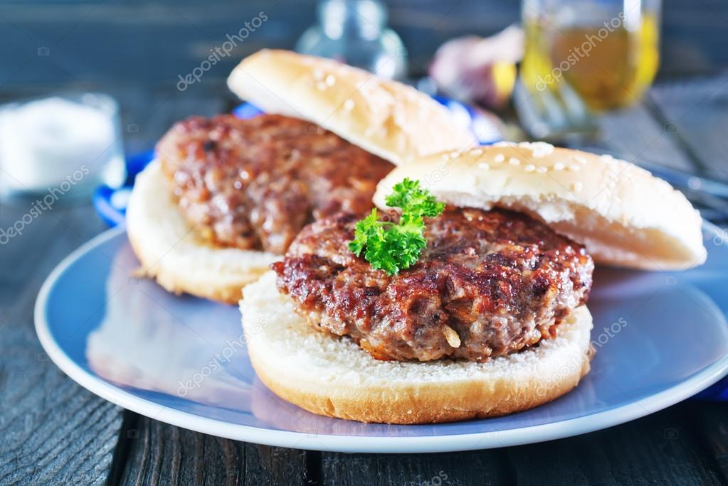 Cutlets with bread on plate