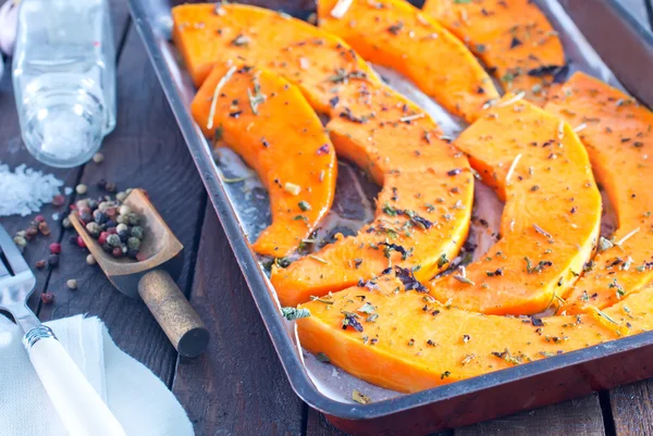 Pumpkin pieces with aroma spice — Stock Photo, Image