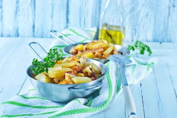 Fried potato in the pan — Stock Image Fried potato in the pan Stock Image