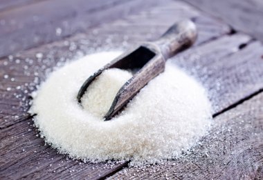 Heap of sugar on table