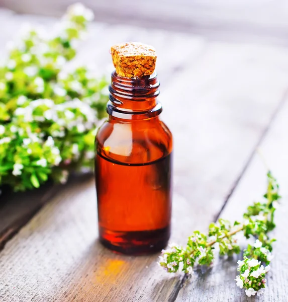 Thyme oil in bootle — Stock Photo, Image