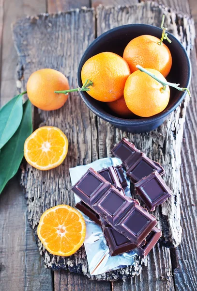 Chocolate y mandarinas — Foto de Stock