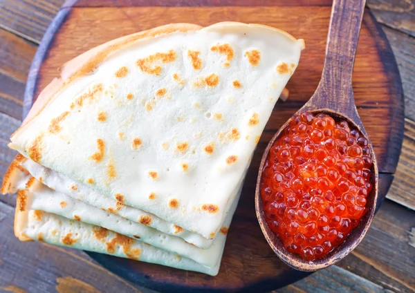 Pancakes with red caviar — Stock Photo, Image