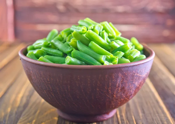 Green peas in bowl — Stock Photo, Image