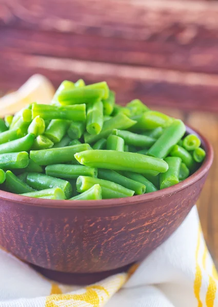 Green peas in bowl — Stock Photo, Image