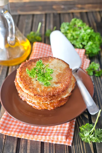 Potato pancakes on plate — Stock Photo, Image