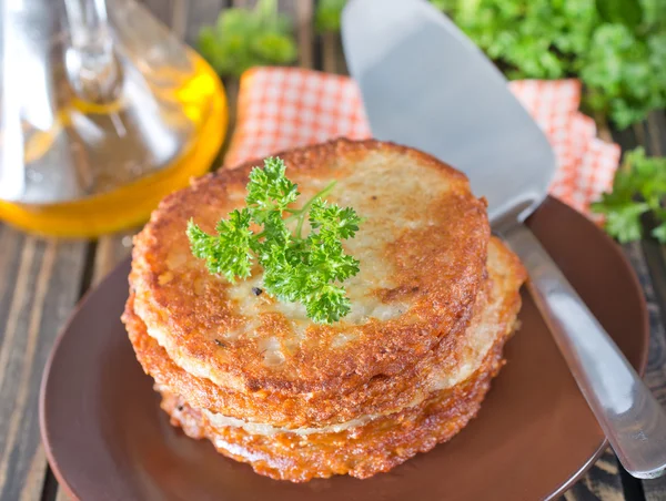 Potato pancakes on plate — Stock Photo, Image