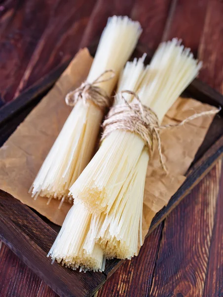 Raw rice noodles — Stock Photo, Image