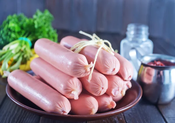 Sausages on plate — Stock Photo, Image