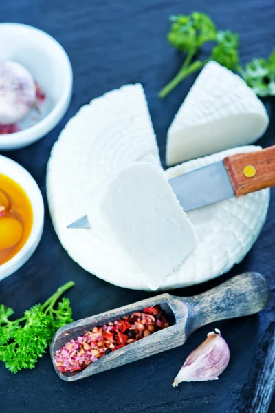 Cheese with olives and oil — Stock Photo, Image
