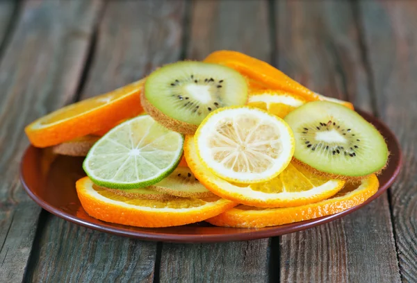 Kiwi and citrus slices — Stock Photo, Image