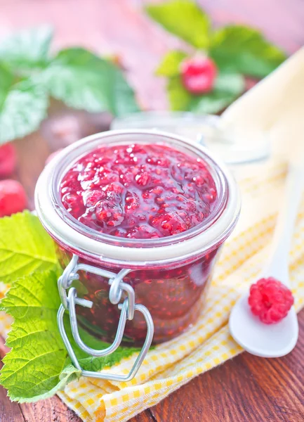 Raspberry jam in glass bank — Stock Photo, Image