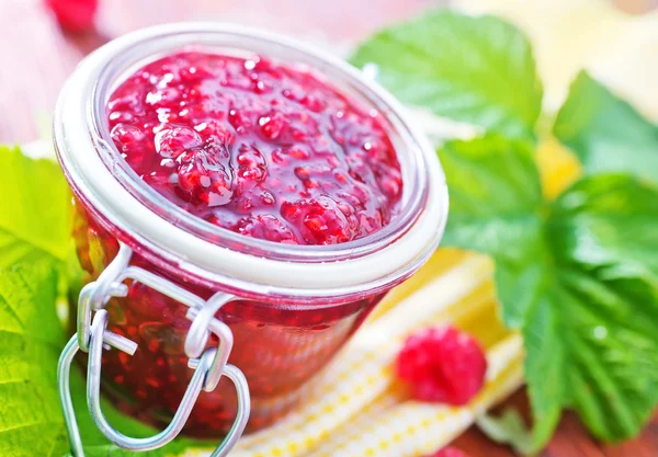 Raspberry jam in glass bank — Stock Photo, Image