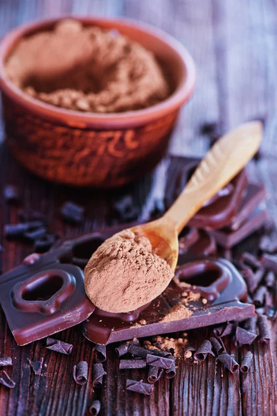 Chocolate and cocoa powder — Stock Photo, Image