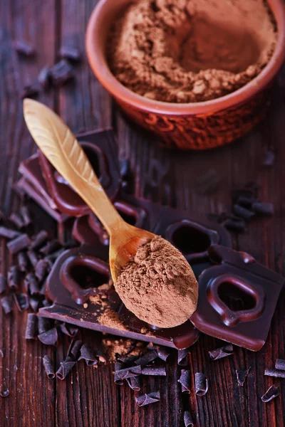 Chocolate and cocoa powder — Stock Photo, Image