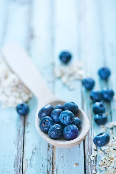 Oat flakes and blueberry — Stock Photo, Image