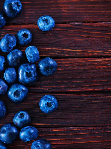 Fresh blueberry on wooden board — Stock Photo, Image