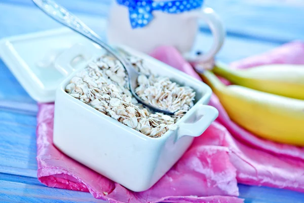 Oat flakes with banana — Stock Photo, Image