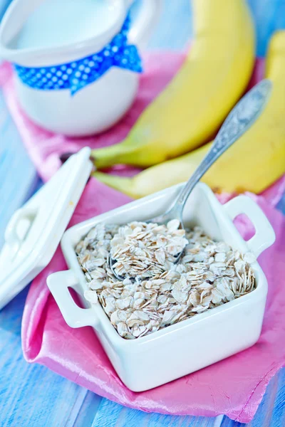 Oat flakes with banana — Stock Photo, Image