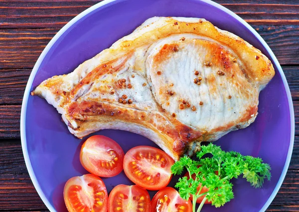 Fried steak with tomato — Stock Photo, Image