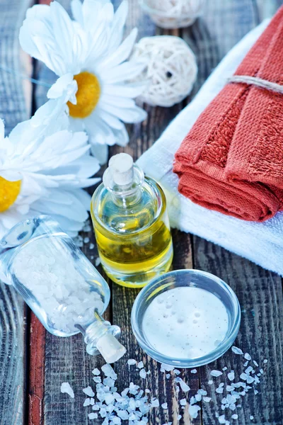 Sea salt and oil in bottles — Stock Photo, Image