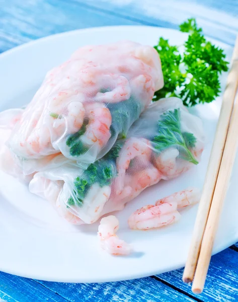 Rolls with shrimps on plate — Stock Photo, Image