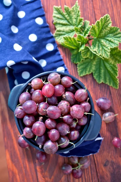 Fresh gooseberry in bowl — Stock Photo, Image