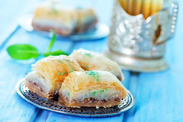 Baklava, Turkish dessert on metal plate — Stock Photo, Image