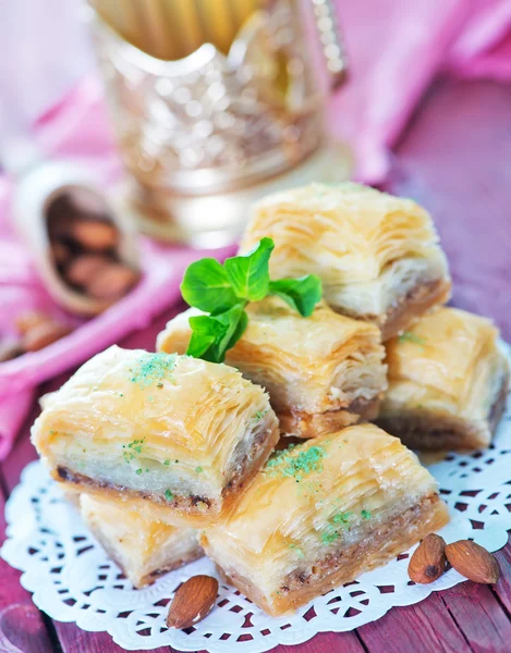 Baklava, Turkish dessert on metal plate — Stock Photo, Image