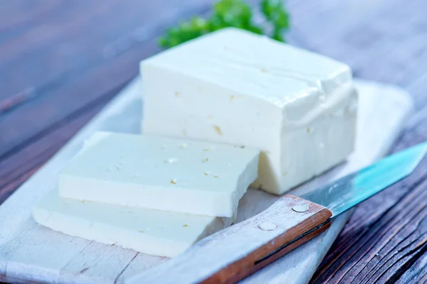 Feta cheese on board — Stock Photo, Image